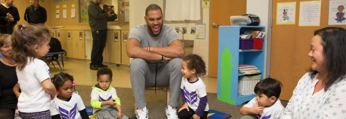 anthony barr with a group of young kids